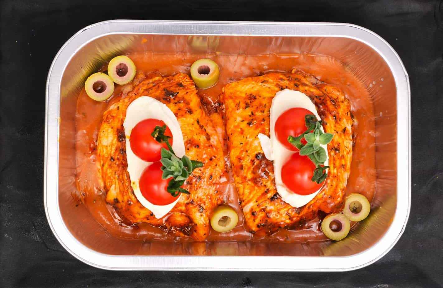 Chicken Thighs Stuffed with Fennel Sausage with Italian Herb & Tomato Sauce